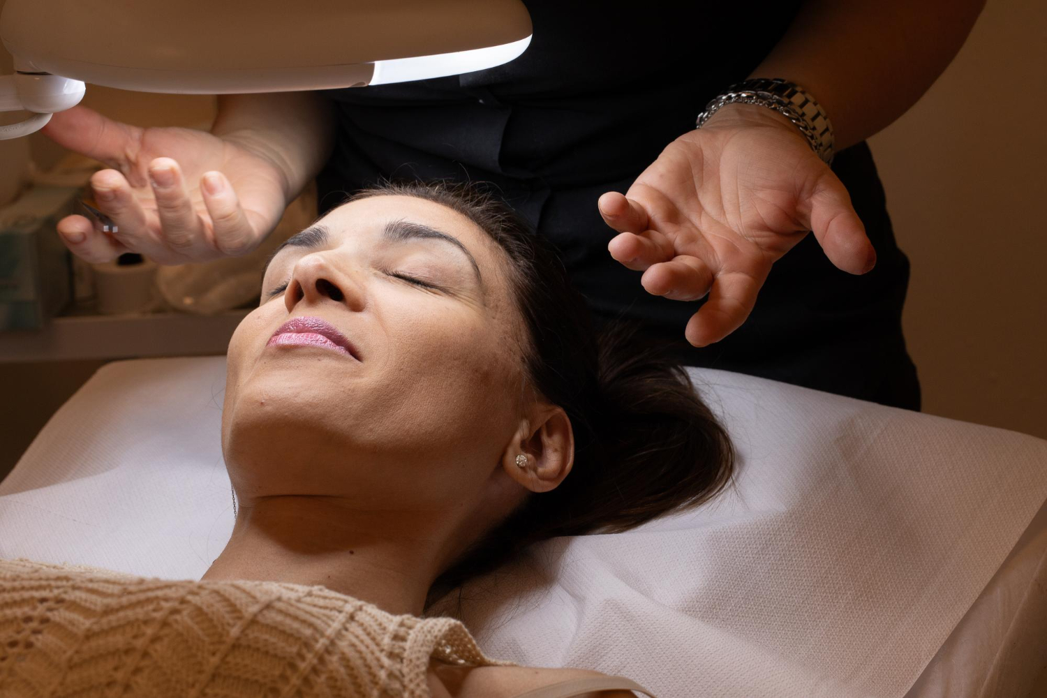 Woman relaxing during a hypnotherapy session