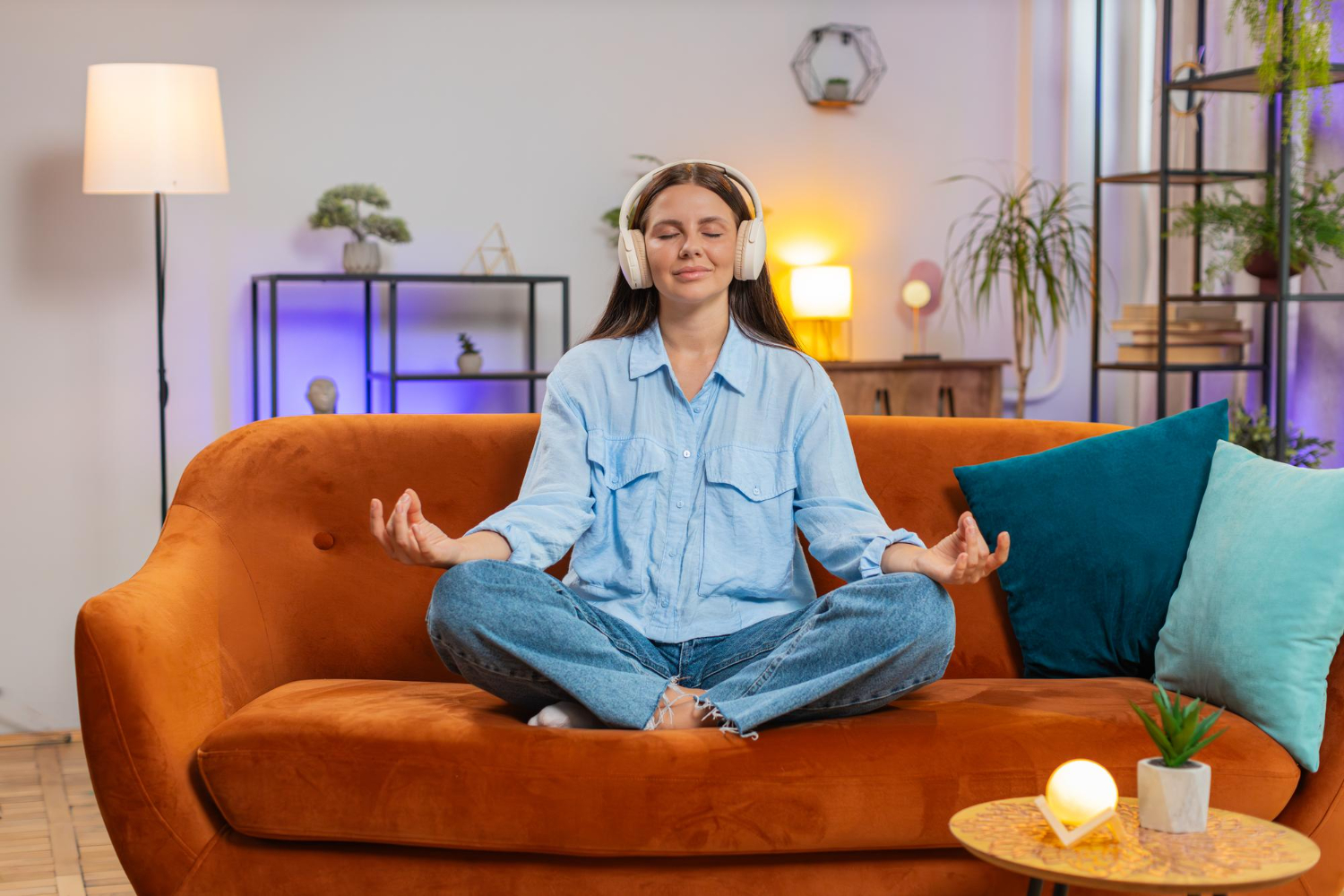 Woman practicing relaxation techniques at home 