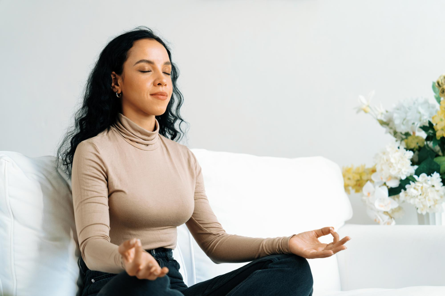 Woman practicing meditation for relaxation and stress relief.